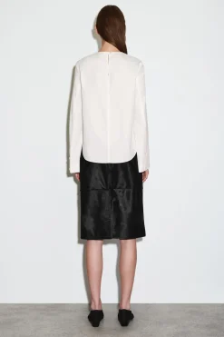 BAUMWOLLBLUSE MIT ABGERUNDETEM SAUM