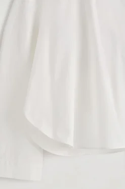 BAUMWOLLBLUSE MIT ABGERUNDETEM SAUM