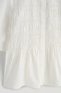BLUSE AUS BAUMWOLLE MIT RAFFUNGEN