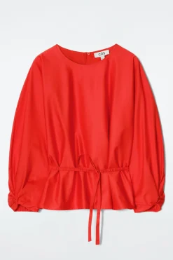 BLUSE MIT SCHÖSSCHEN UND KORDELZUG