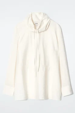 BLUSE MIT STEHKRAGEN MIT KORDELZUG