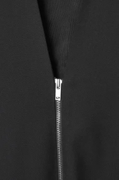 DAS ÄRMELLOSE ELEGANTE WOLLKLEID