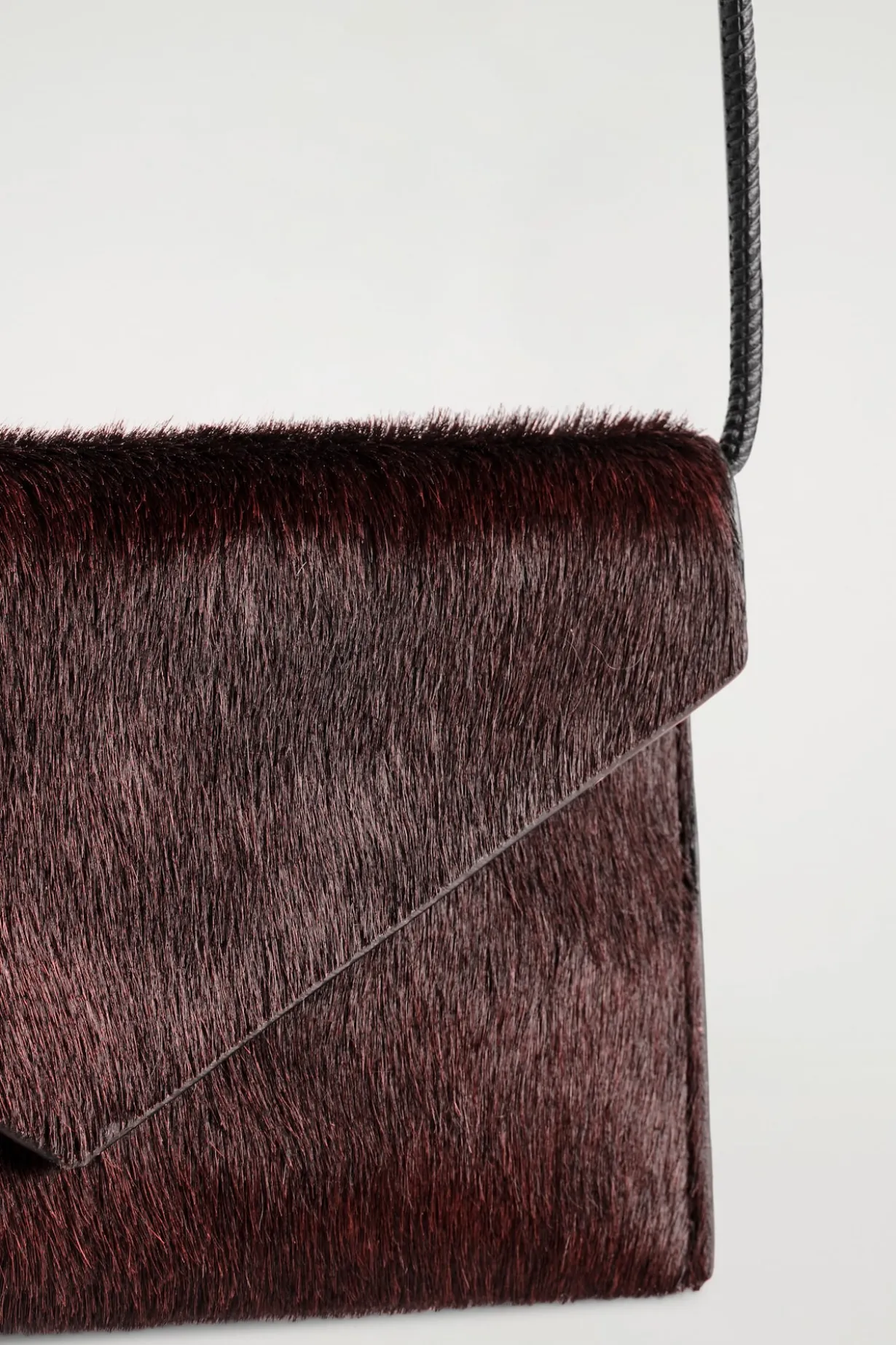 HANDYTASCHE - LEDER MIT PONYHAAR-EFFEKT