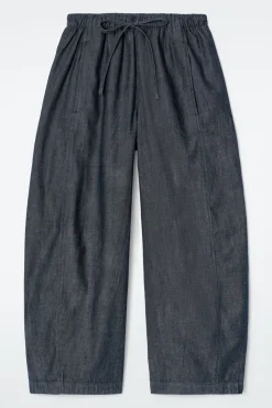 HOSE AUS DENIM MIT KORDELZUGBUND UND BARREL-BEIN
