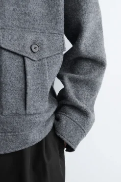 JACKE AUS GEKOCHTER WOLLE