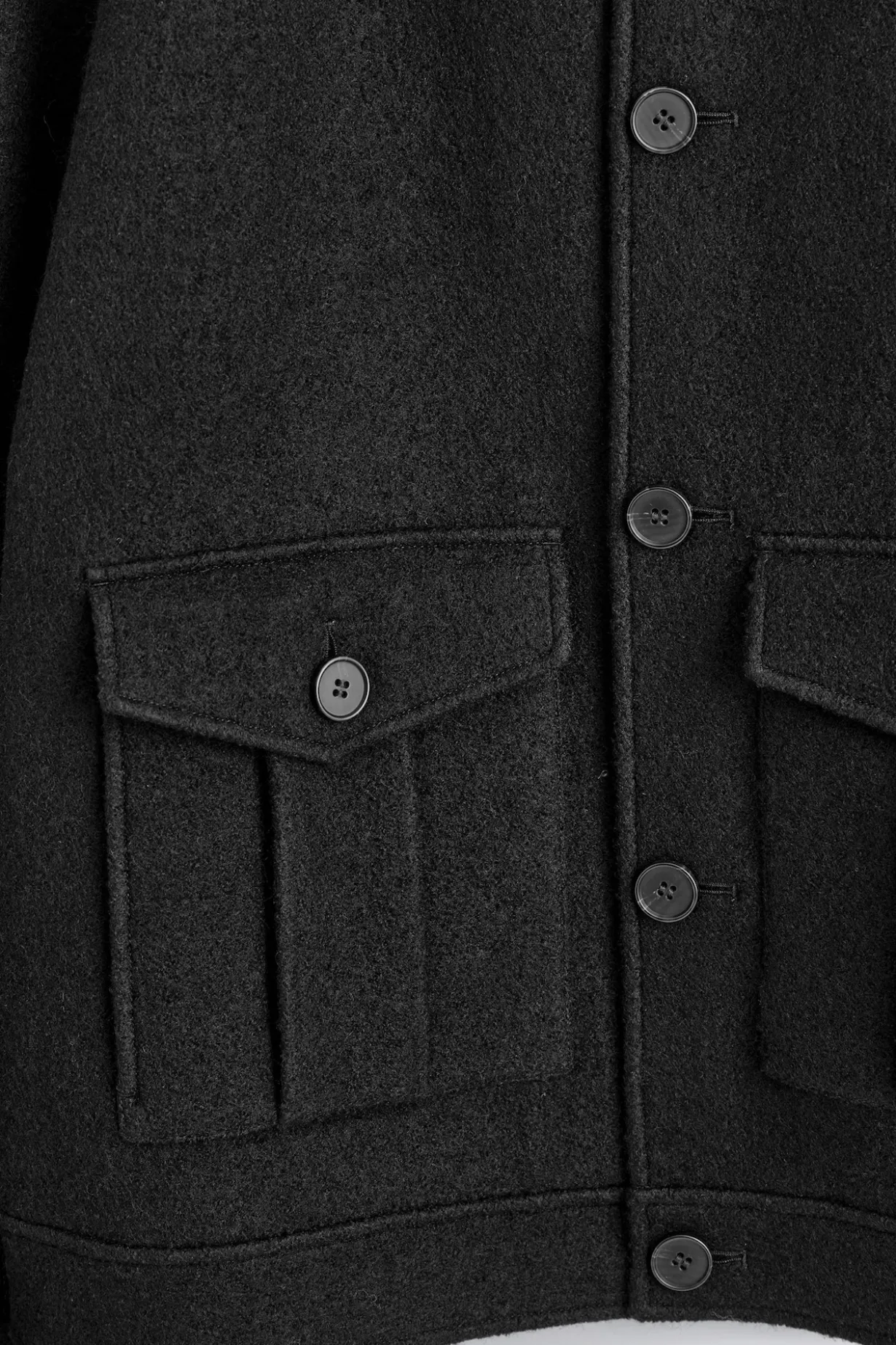 JACKE AUS GEKOCHTER WOLLE