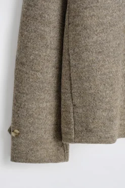 JACKE AUS KOCHWOLLE MIT GERIPPTEM KRAGEN