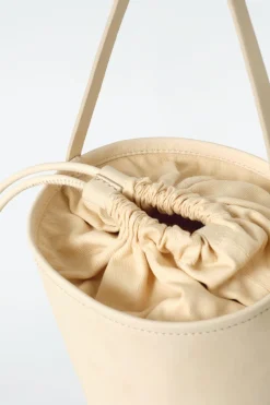KLEINE BEUTELTASCHE - NUBUKLEDER