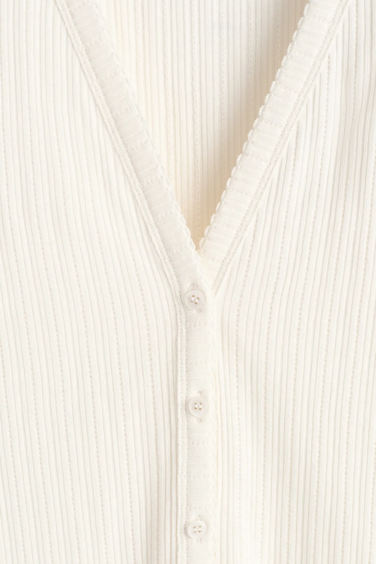 KURZÄRMLIGE STRICKJACKE AUS POINTELLE-STRICK