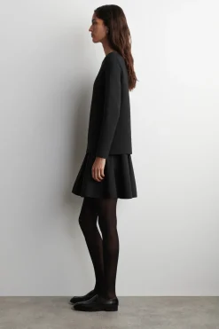 MEHRLAGIGES MINIKLEID MIT LANGEN ÄRMELN
