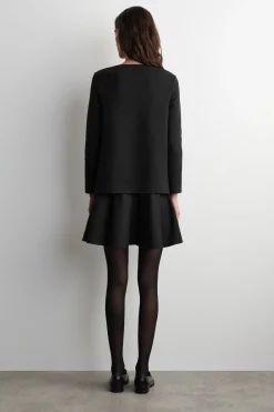 MEHRLAGIGES MINIKLEID MIT LANGEN ÄRMELN