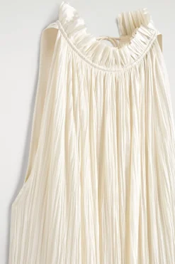 MIDIKLEID AUS SATIN IN KNITTEROPTIK