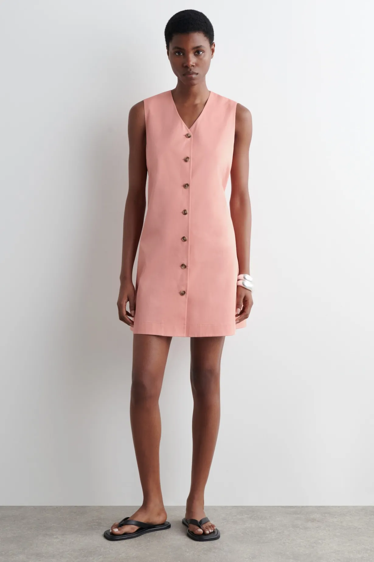 MINIKLEID AUS PIMA-BIOBAUMWOLLE MIT KNÖPFEN