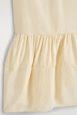 MINIKLEID MIT RAFFUNGEN