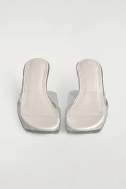 MULES AUS PERSPEX MIT KITTEN-HEEL