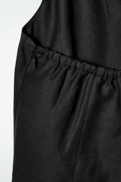 OBERTEIL AUS LEINEN MIT TWIST-DETAIL