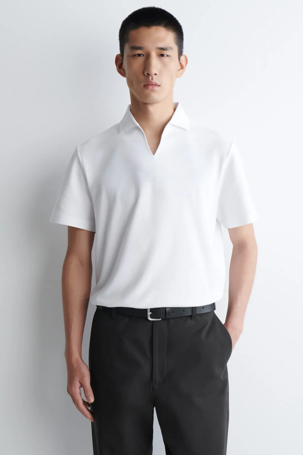 PIQUÉ-POLOSHIRT AUS TECHNISCHEM MATERIAL