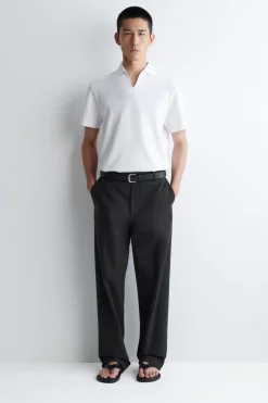 PIQUÉ-POLOSHIRT AUS TECHNISCHEM MATERIAL