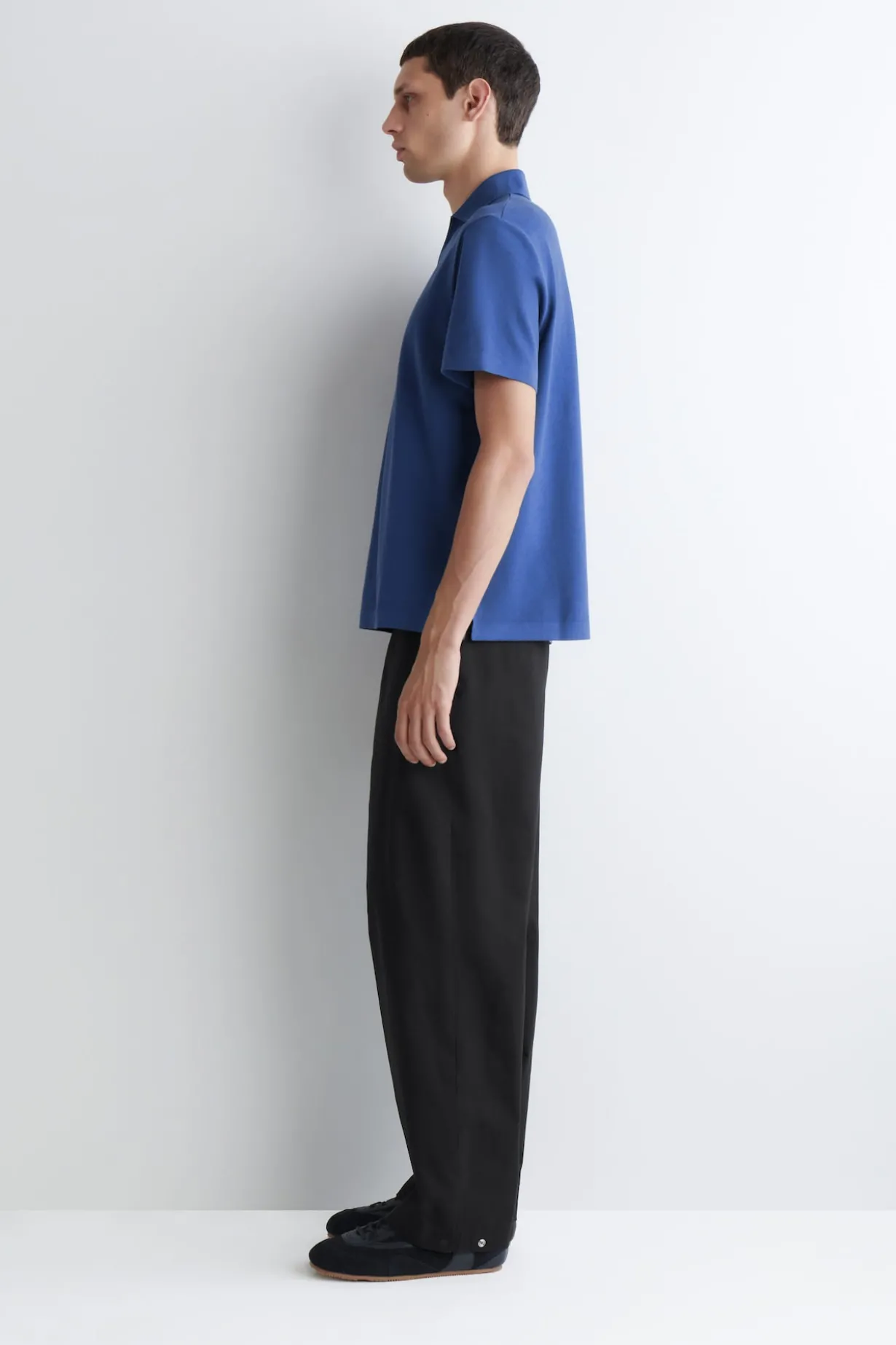 PIQUÉ-POLOSHIRT AUS TECHNISCHEM MATERIAL