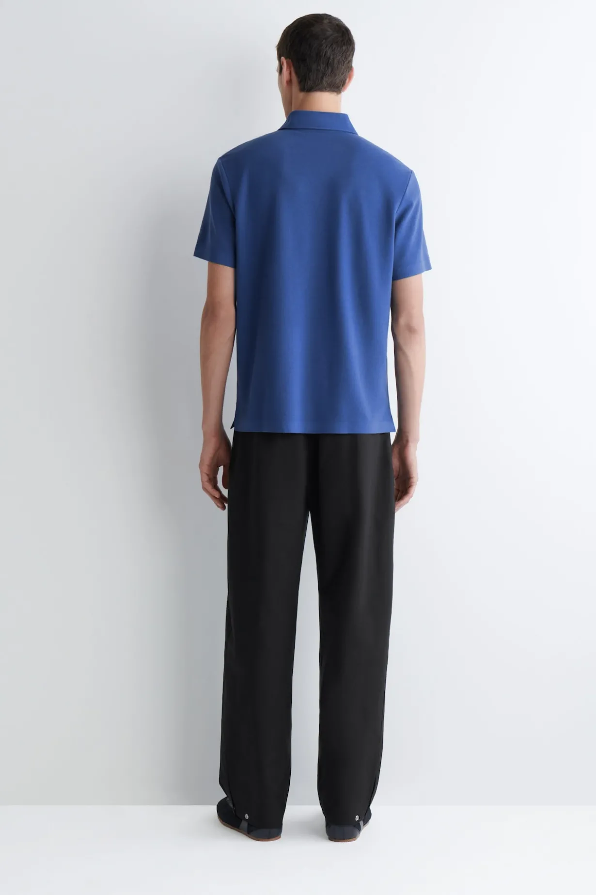PIQUÉ-POLOSHIRT AUS TECHNISCHEM MATERIAL