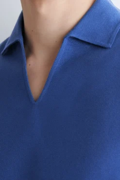 PIQUÉ-POLOSHIRT AUS TECHNISCHEM MATERIAL