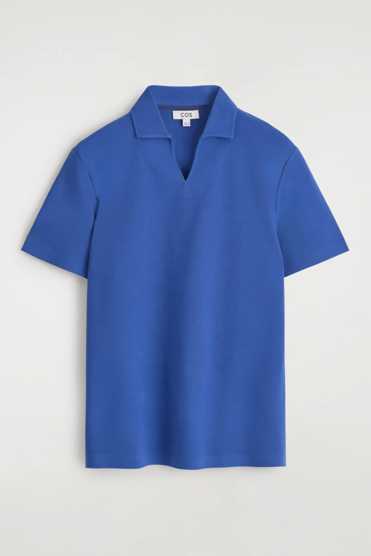 PIQUÉ-POLOSHIRT AUS TECHNISCHEM MATERIAL