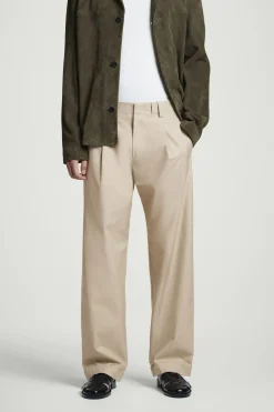 SCHMAL ZULAUFENDE HOSE AUS BAUMWOLLE MIT UMSCHLAG