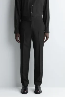 SCHMAL ZULAUFENDE WOLLHOSE MIT KUMMERBUND
