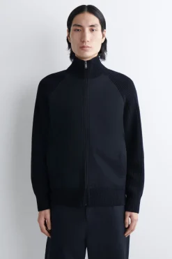 TRAININGSJACKE AUS MERINOWOLLE MIT BAUMWOLLPARTIE