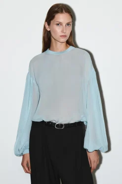 TRANSPARENTE BLUSE MIT BALLONÄRMELN