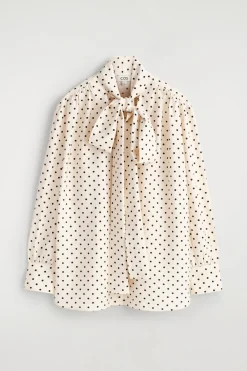 T-SHIRT MIT SCHALDETAIL UND POLKA-DOTS