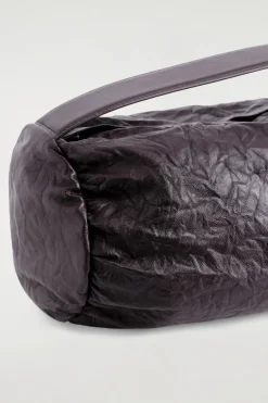 ZYLINDER-CLUTCH - STRUKTURIERTES LEDER